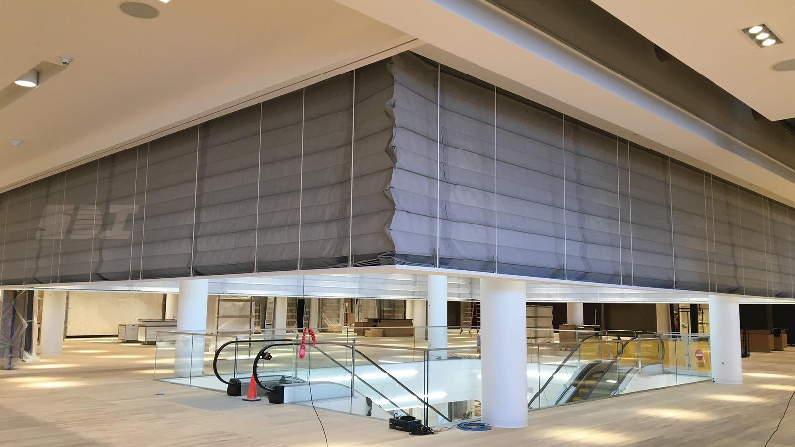 Fire smoke curtain installation for large building opening